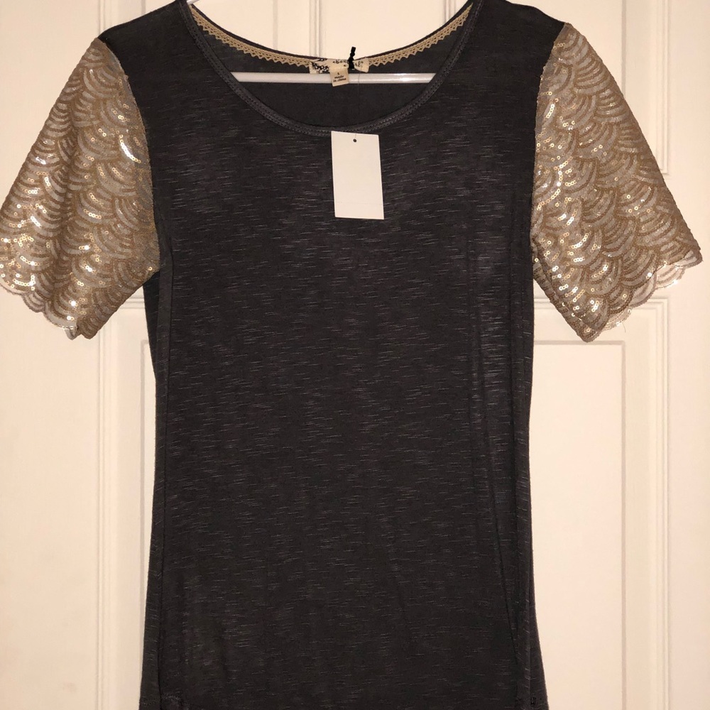 Women’s grey top with sequined sleeves